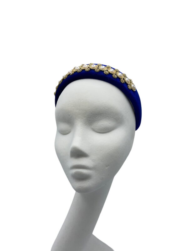 Cobalt blue padded millinery made headband with embellished detail.